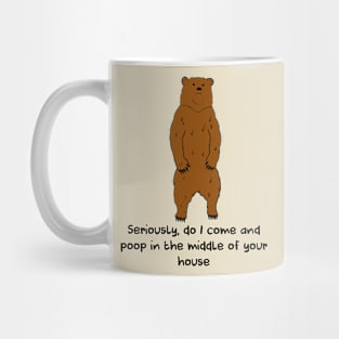 What a bear does in the woods Mug